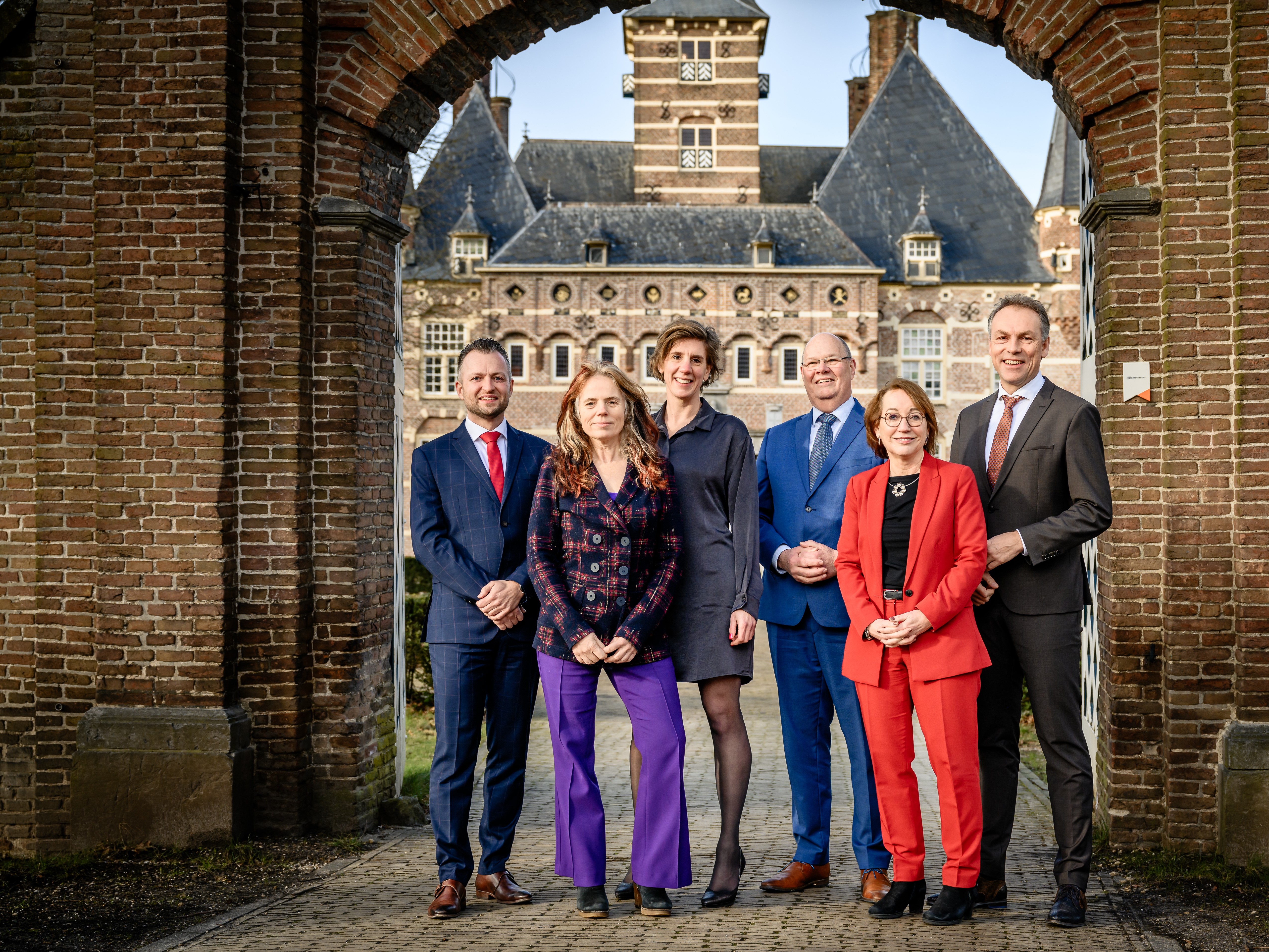 Foto met college leden